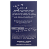 Back of royal blue 8oz. box of rich and creamy hot chocolate with mixing instructions.