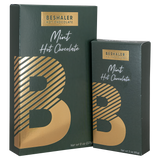 Dark green 8oz. and 3oz. boxes of mint flavored hot chocolate with gold foil lettering.