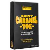 Black and yellow 8oz. box salted caramel hot chocolate named Salty Caramel Toe.