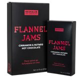 Black 8oz and 3oz boxes of cinnamon & nutmeg hot chocolate with red lettering.