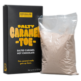 Black and yellow 8oz. box salted caramel hot chocolate named Salty Caramel Toe.