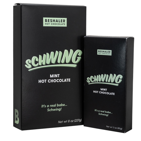 Black and green 8oz. and 3ox. boxes of mint flavored hot chocolate called Schwing.